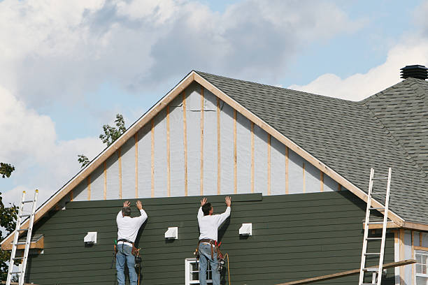 Professional Vinyl Siding technician working in Etters, PA